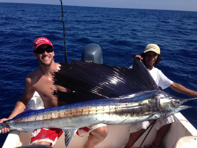 Brandon with one of his many Sailfish he caught while visiting Bahia La Tortuga Fishing Lodge